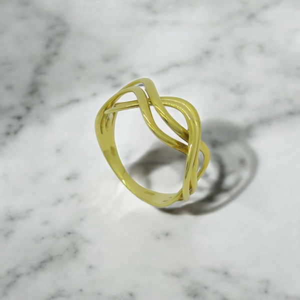 Anello onda in oro giallo 18 ct