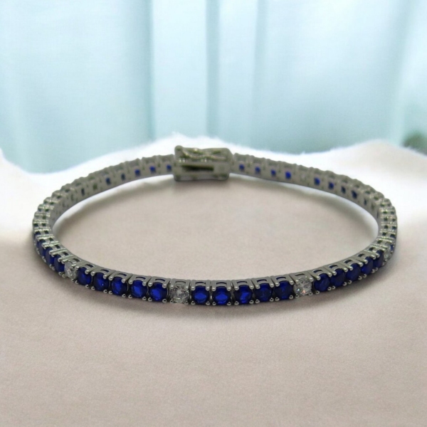 Bracciale tennis pietre blu alternate in argento